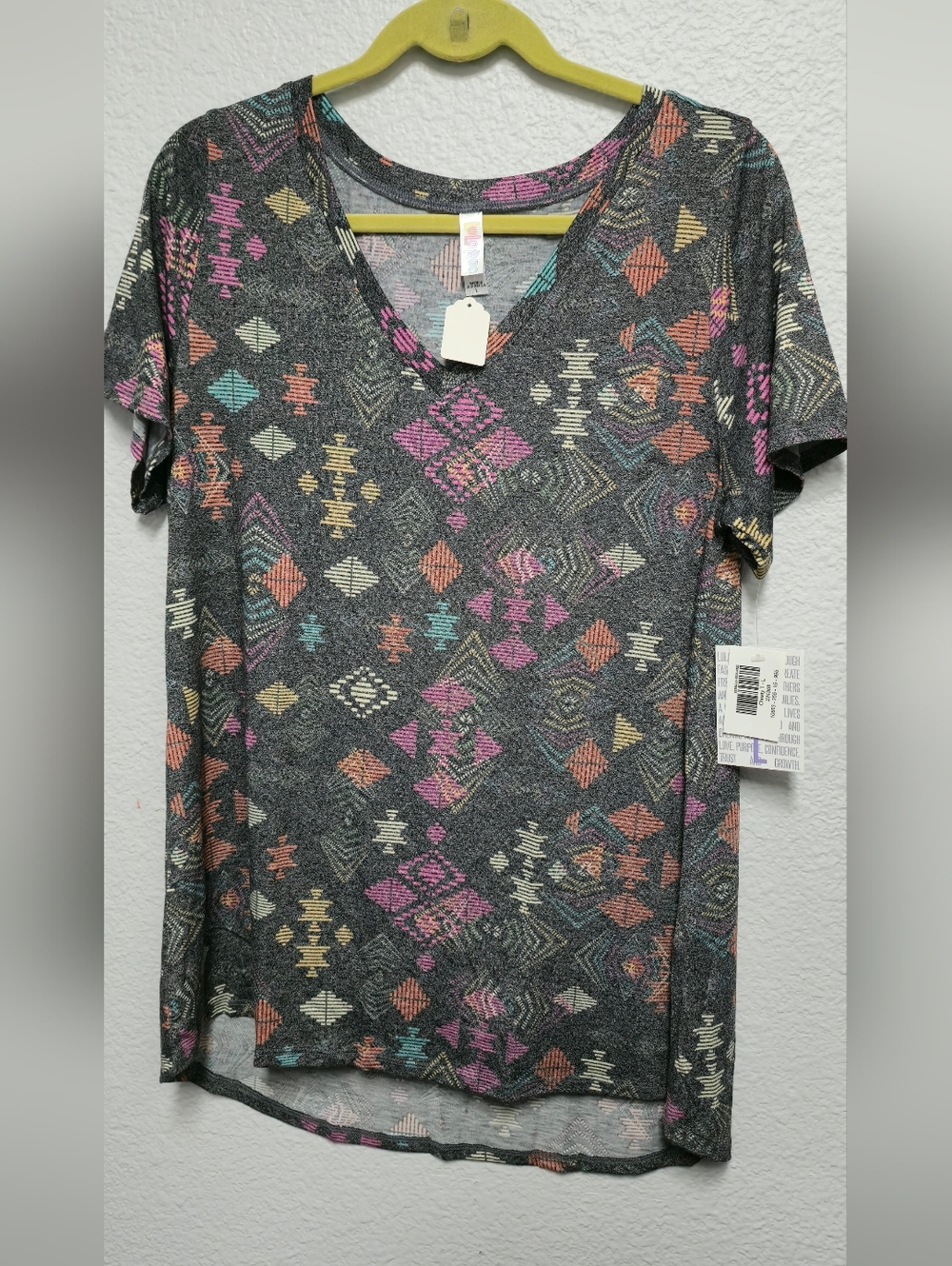 LuLaRoe Charcoal V-Neck Tee with Pink, Teal, Yellow & Orange Aztec Print